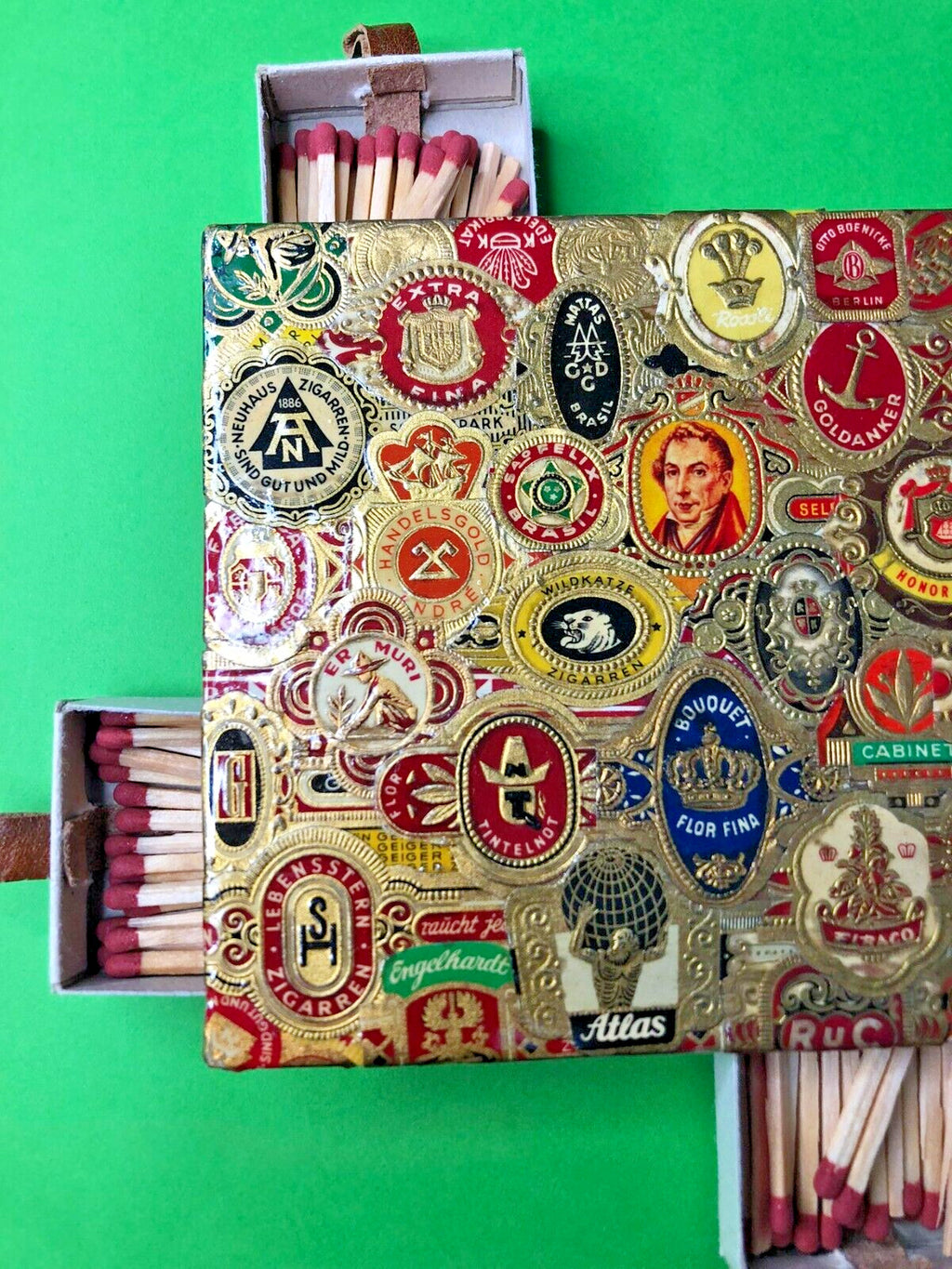 Vintage cigar band collage with Handelsgold and Flor Fina labels