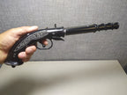 USSR metal pistol souvenir close-up of the details