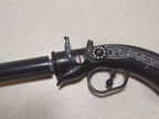 Russian metal pistol souvenir for collectors on display