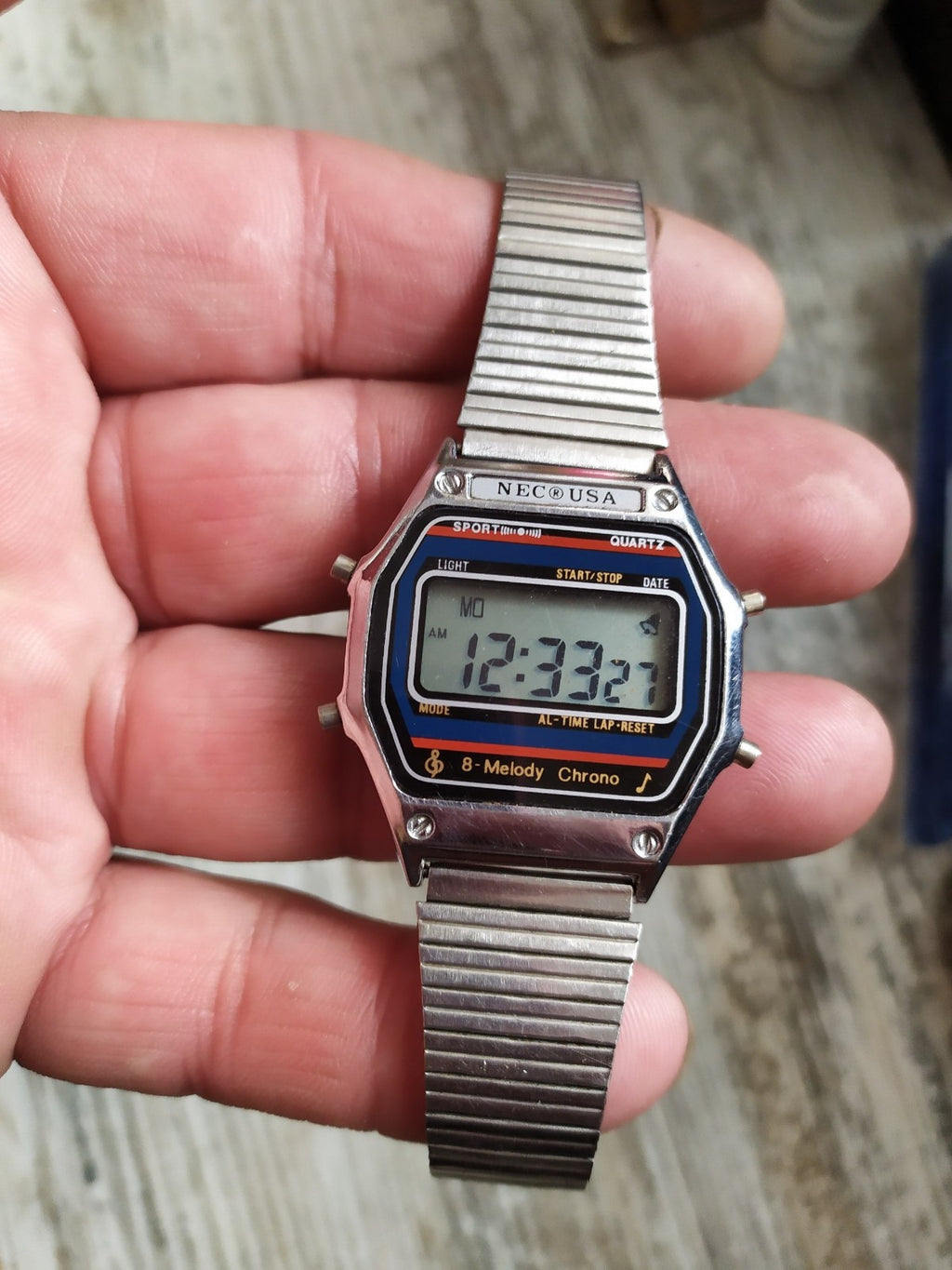 Vintage NECO USA 8-Melody Chrono LCD digital watch with metal case and bracelet