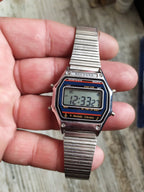 Vintage NECO USA 8-Melody Chrono LCD digital watch with metal case and bracelet