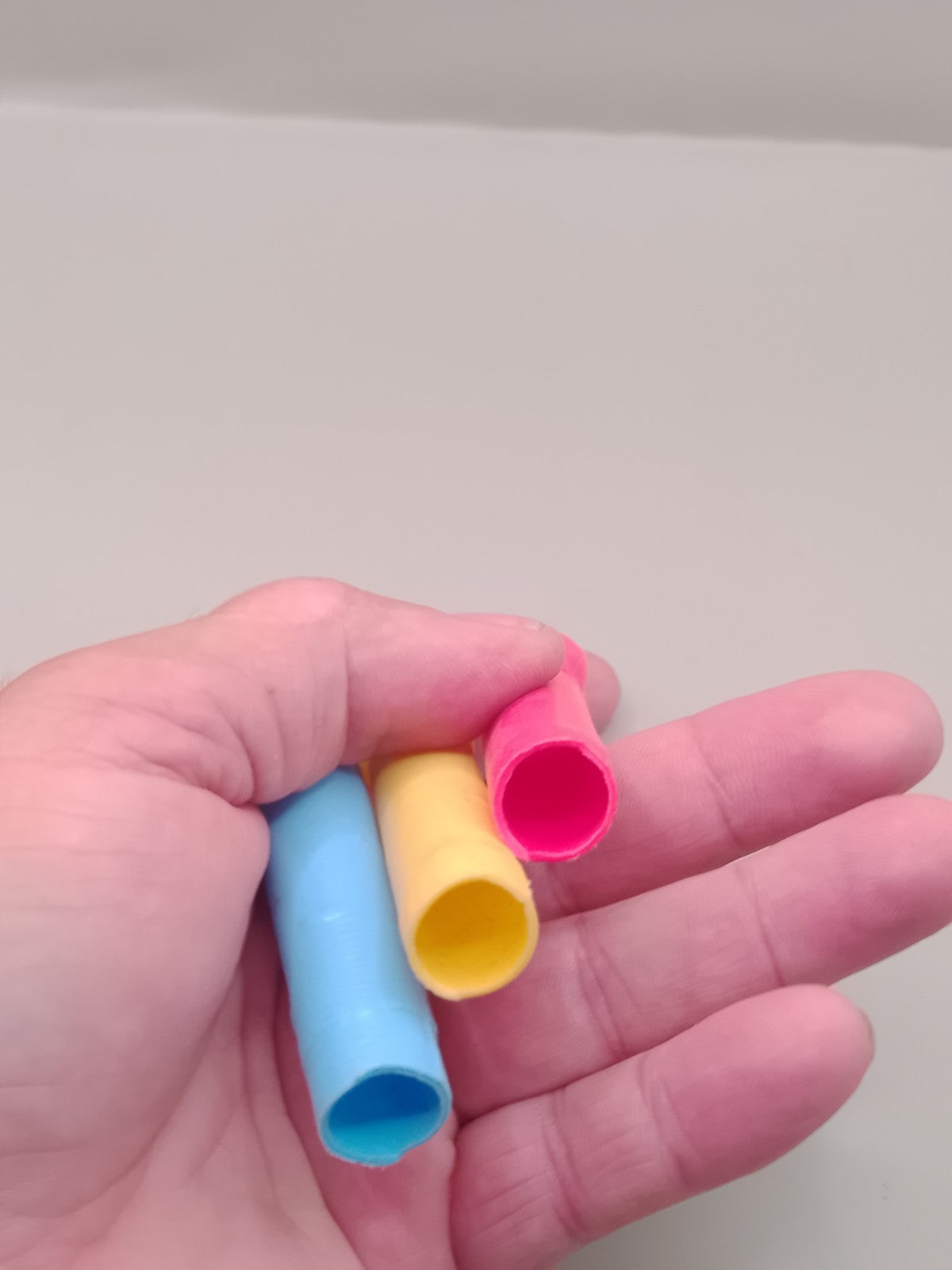 Close view of the ribbed fluted pattern on the plastic caps