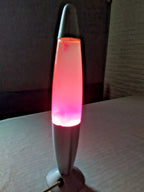 Retro lava lamp with tapered top and base in silver finish