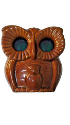 Soviet VFD clock with green glowing digits showing 06:02 in the owl's eyes – detail 6