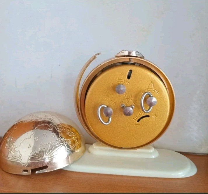 Factory stamps and Soviet price tags on the base of the Slava clock