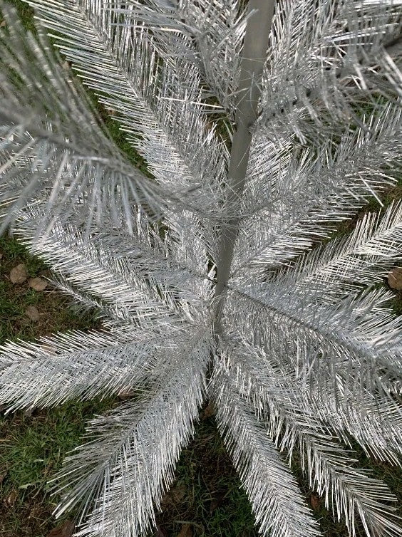 Soviet New Year tree silver branches close-up