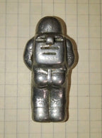 Soviet space collectibles: metal cosmonaut miniature with life support backpack