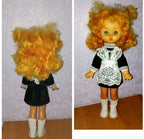 Soviet dolls with green sleep eyes and long blonde and ginger rooted hair
