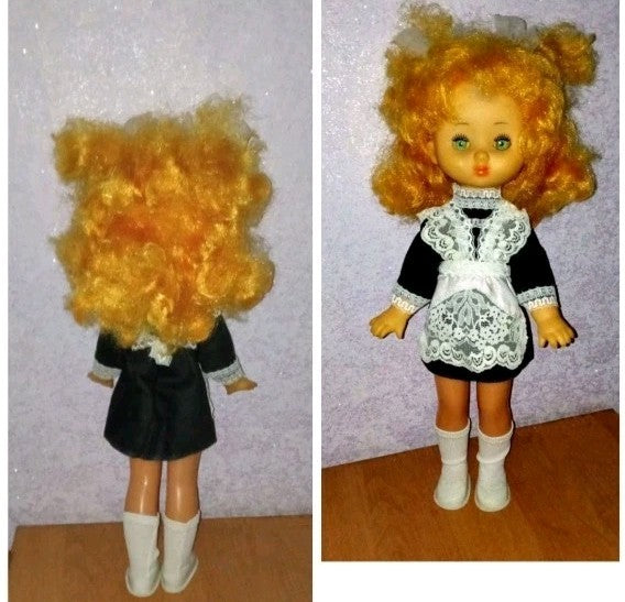 Soviet dolls with green sleep eyes and long blonde and ginger rooted hair