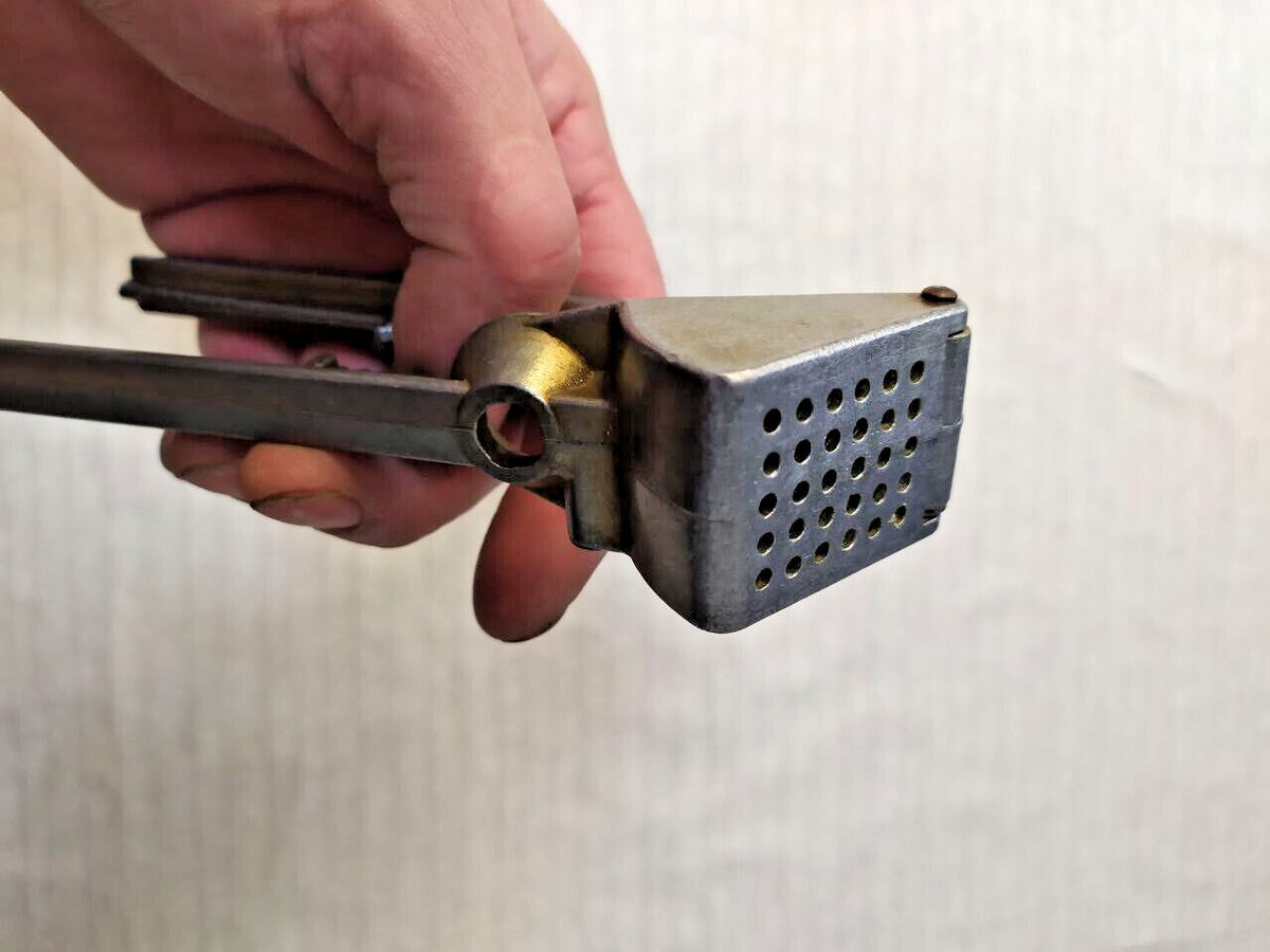 Used vintage garlic crusher made in the Soviet Union, detail