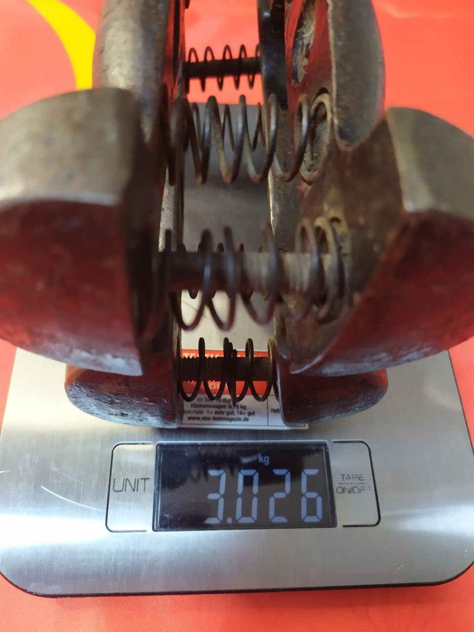 Close-up of Soviet hand gripper steel spring and aged patina – detail 10