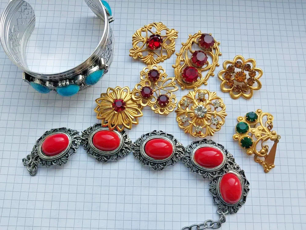 Vintage Soviet jewelry lot with brooches and bracelets in gold-tone and silver-tone