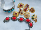 Vintage Soviet jewelry lot with brooches and bracelets in gold-tone and silver-tone