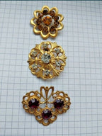 Ruby red faceted crystal brooches in gold-tone settings – detail 8
