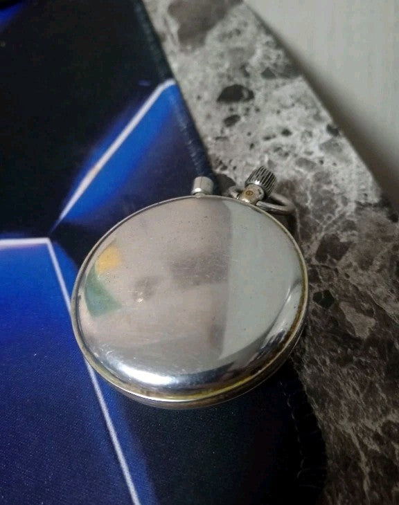 Agat stopwatch made in USSR, close-up of the dial and crown – detail 5