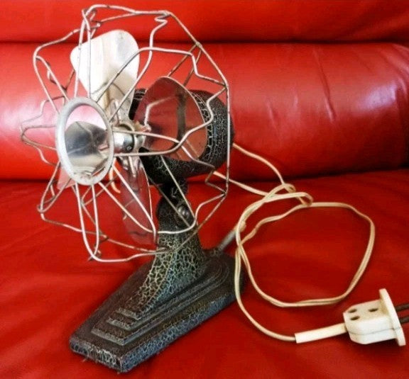 Vintage Soviet VN-3 electric table fan made in Yaroslavl with black and red cast metal body