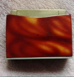 Vintage Soviet table lighter with marbled red and amber carbolite style body