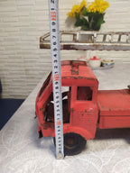 SIM Serp i Molot logo on the front of the Soviet toy fire truck – detail 11