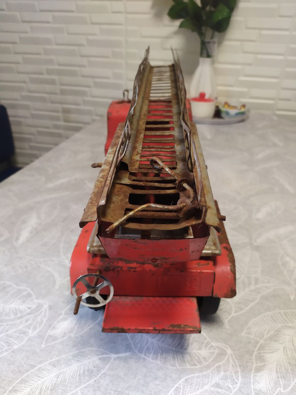 Large USSR toy ladder truck with turning mechanism, side view