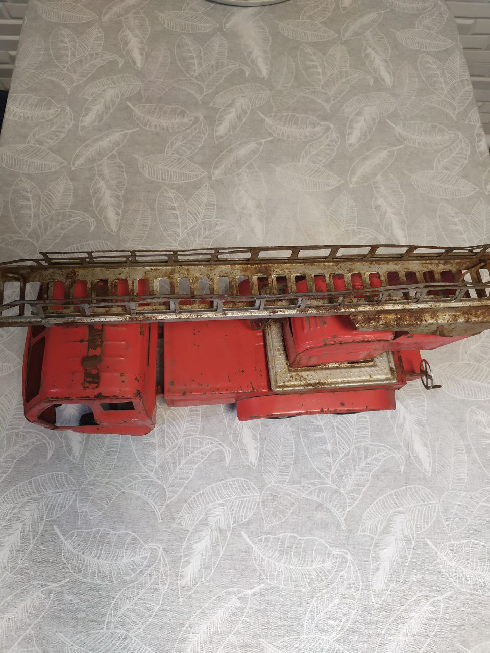 Embossed Soviet price stamp 19-82 on the rear of the toy truck – detail 6