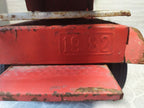 SIM Serp i Molot logo on the front of the Soviet toy fire truck – detail 8