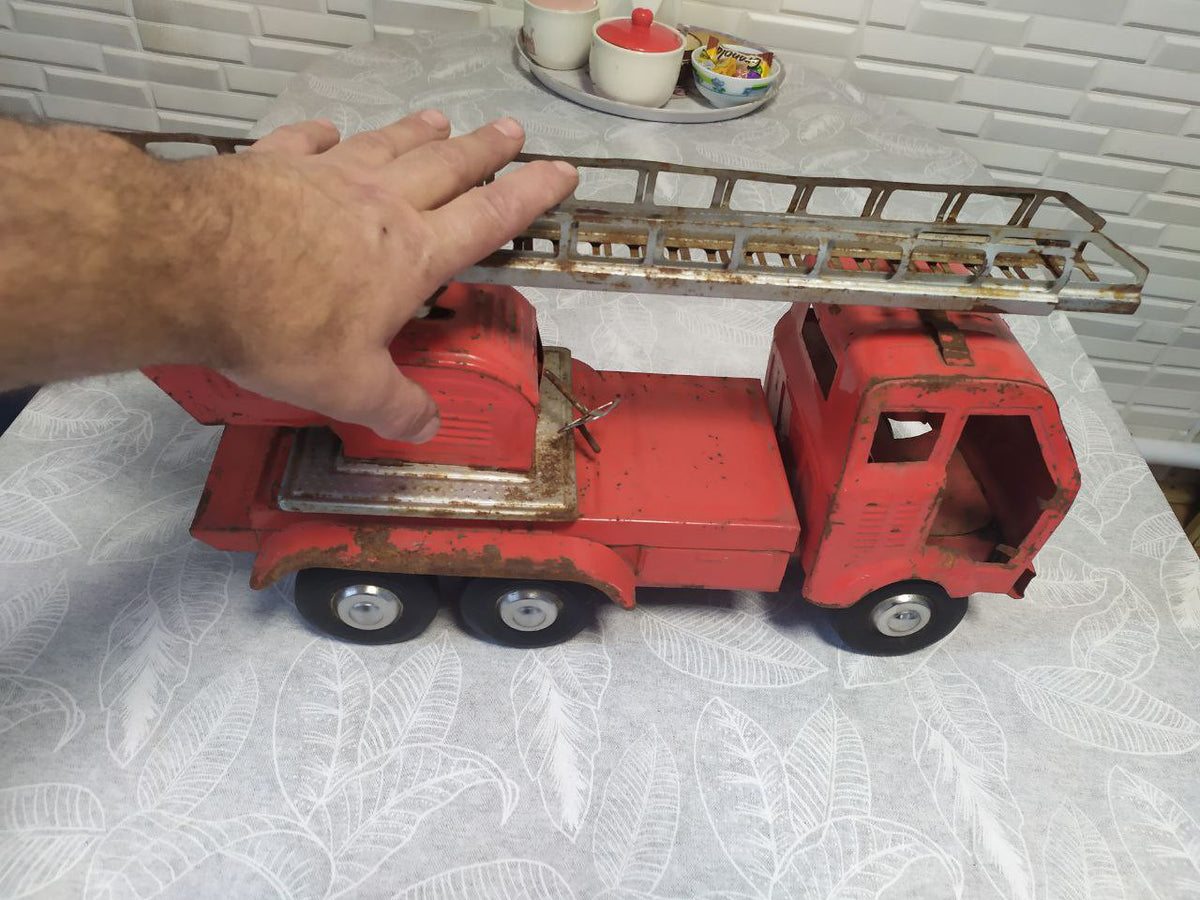 Embossed Soviet price stamp 19-82 on the rear of the toy truck – detail 9