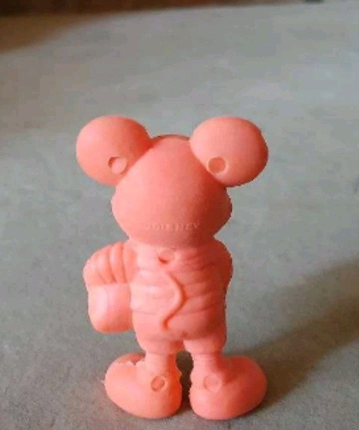 Soviet Mickey Mouse figure back view with worn marking on the head and neck