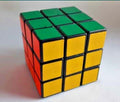 Vintage Soviet toy 3x3 Rubik's Cube with black plastic body and colored stickers