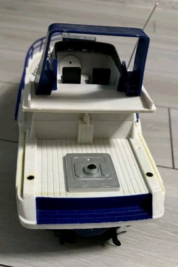 Old Soviet toys: plastic yacht underside with two propellers