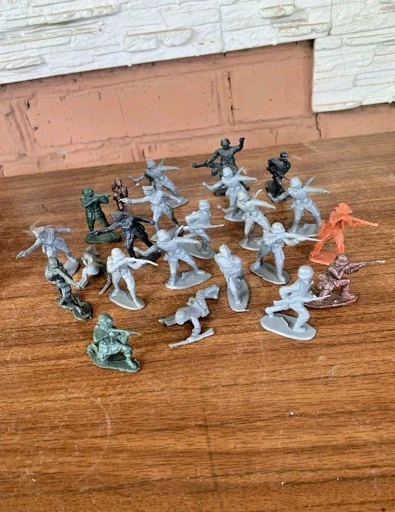 Vintage Soviet toys: lot of plastic toy soldiers in gray, green, brown, black and orange