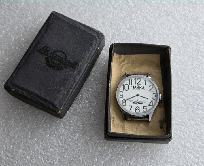 Chaika watch winged star logo with red star on the dial