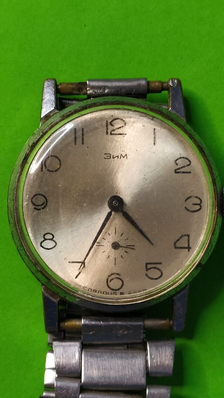 ZIM Pobeda watch dial marked ZiM and Made in USSR in Cyrillic