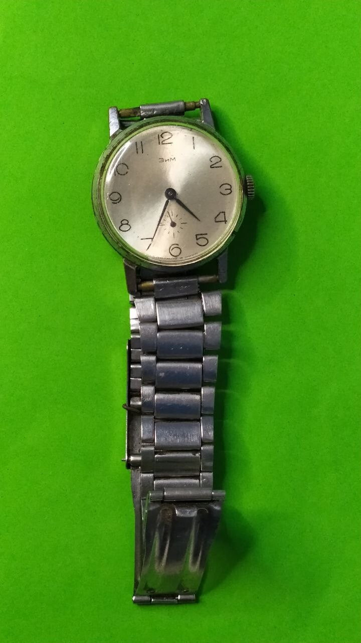 Soviet antique watch chrome-plated case showing brassing and scratches – detail 6