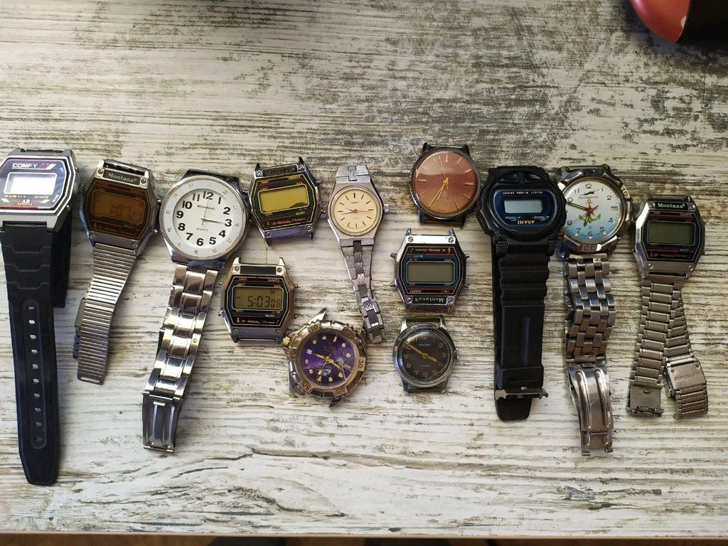 Lot of 13 vintage Soviet wristwatches from the USSR sold for parts or repair