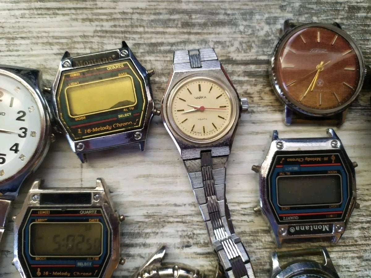 Assorted old Soviet watches laid out together – detail 10