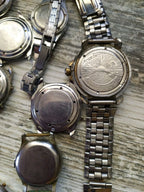 Assorted old Soviet watches laid out together – detail 13