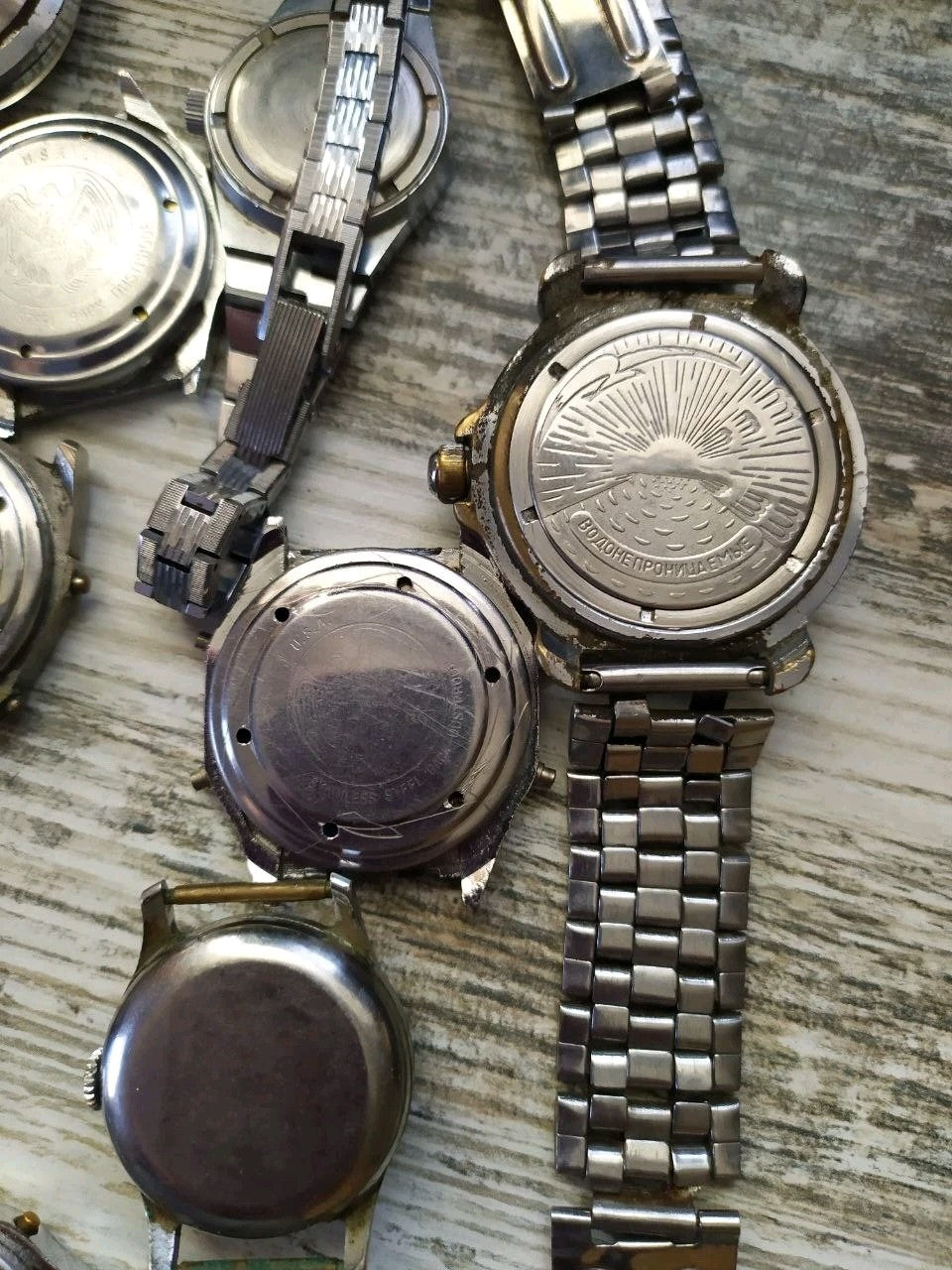 Assorted old Soviet watches laid out together – detail 13
