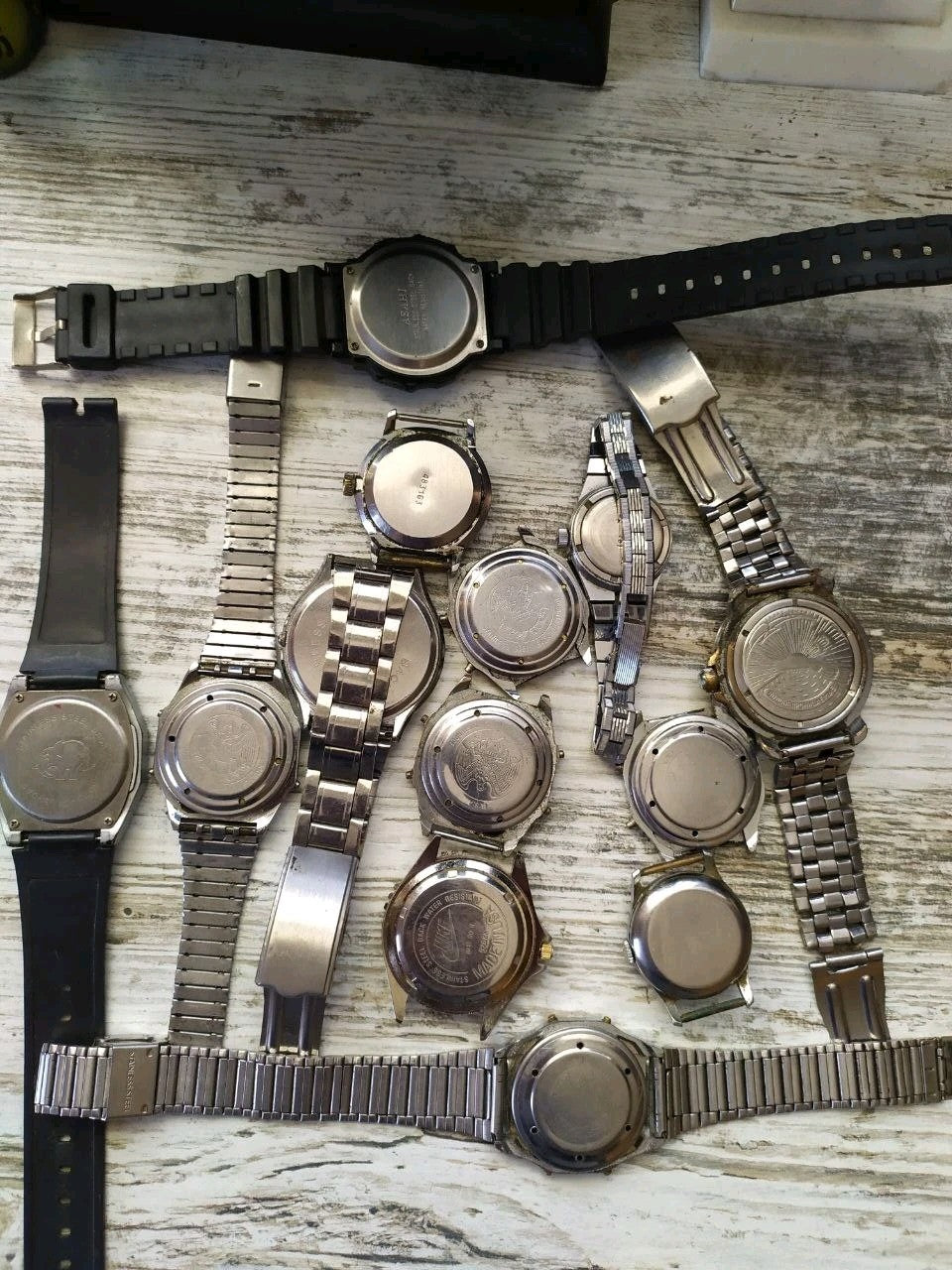 Assorted old Soviet watches laid out together – detail 16
