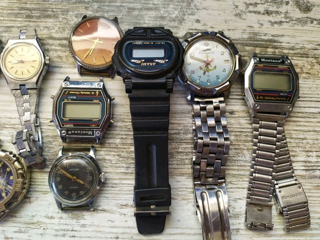 Assorted old Soviet watches laid out together – detail 7