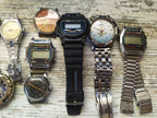 Assorted old Soviet watches laid out together – detail 7