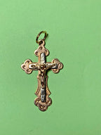 14K gold crucifix pendant with Jesus Christ figure, close-up