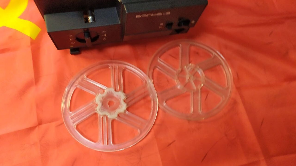 Interior of a Soviet 8mm projector showing original transformer and motor – detail 12