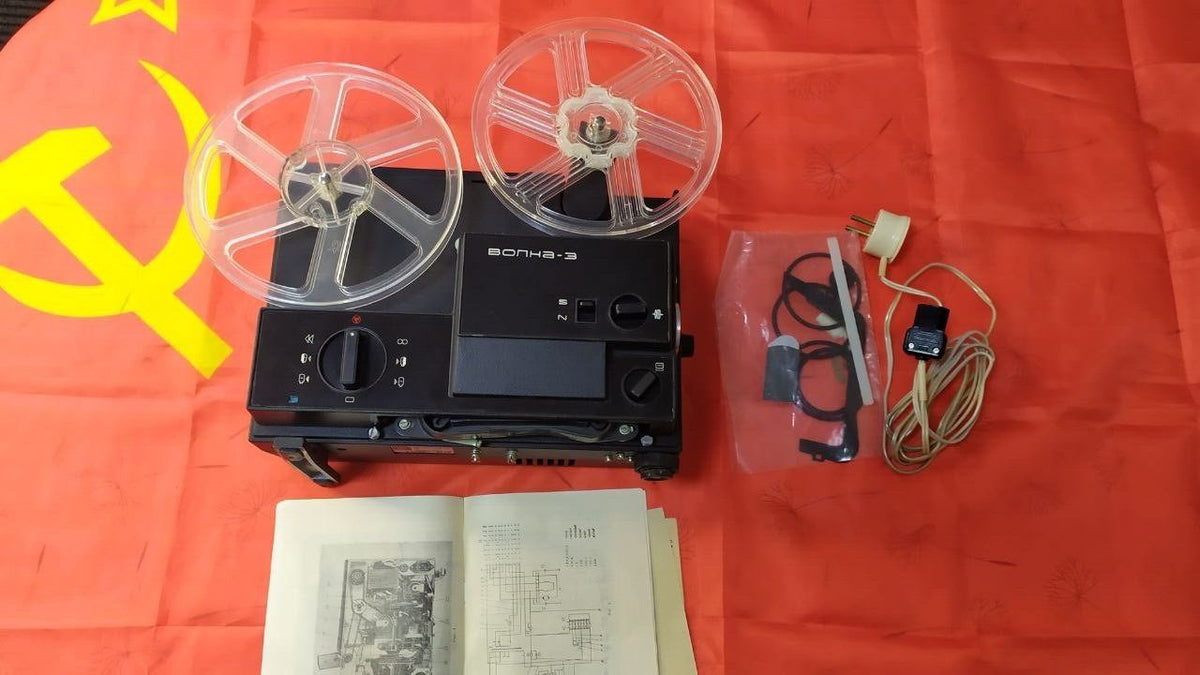 Vintage Volna-3 8mm movie projector with original leatherette hard case