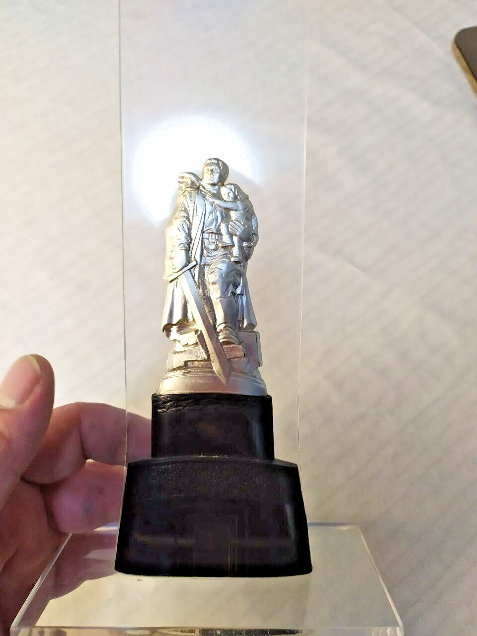 Silver metallized plastic soldier figurine of the Berlin Treptow monument