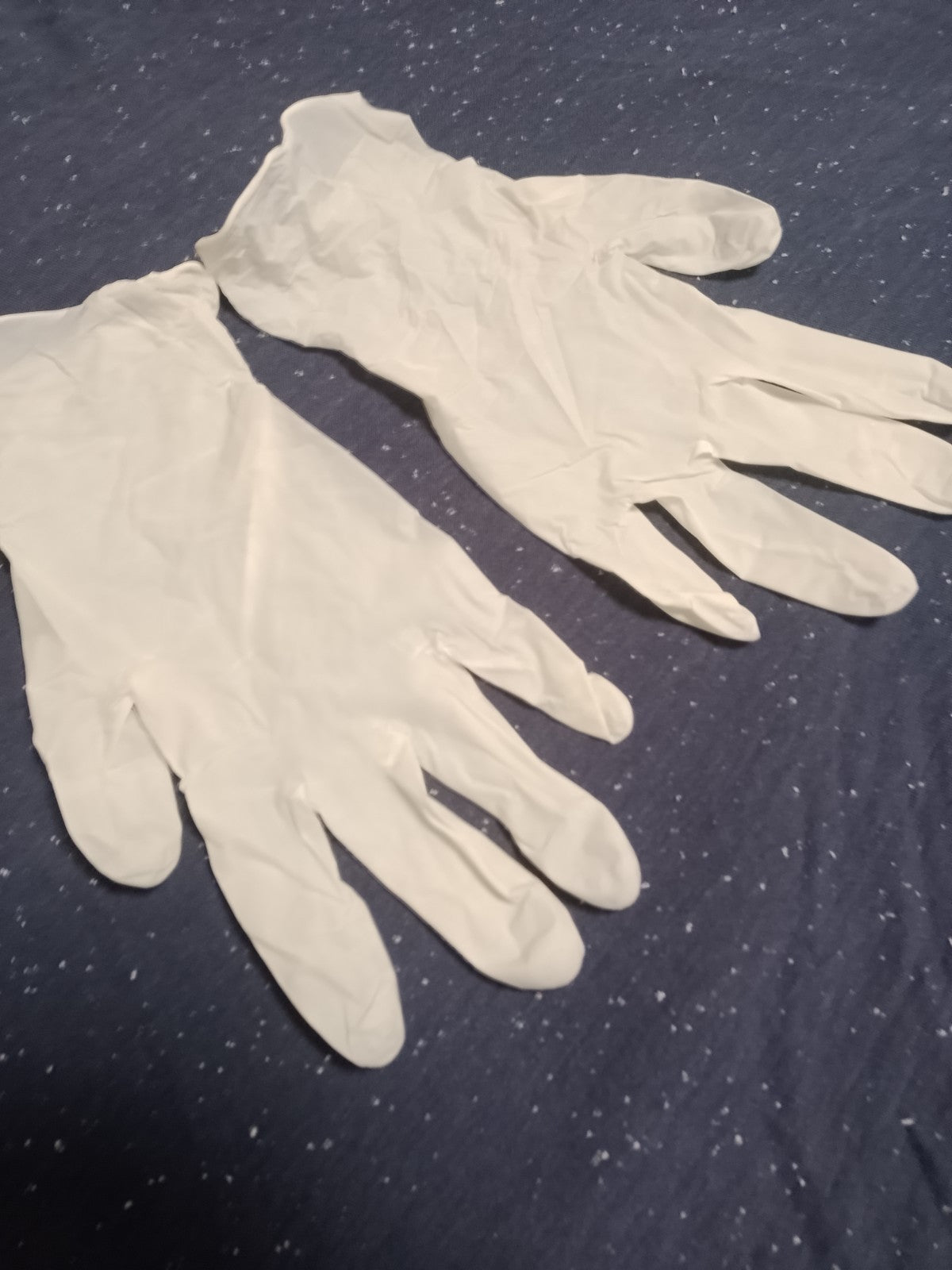 Disposable protective latex rubber gloves