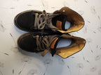 Pre-owned women's leather boots showing the soles and heels – detail 6