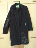 Women's long hooded parka in black with Thinsulate insulation and graphic lettering print