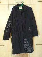 Women's long hooded parka in black with Thinsulate insulation and graphic lettering print