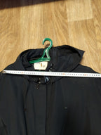 Women's black parka coat with full-length zipper and storm flap – detail 14