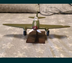 Yak-3 model in green camouflage with red star insignia on wings and tail